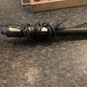 ghd 1.25 Black Curling Iron 
Great condition